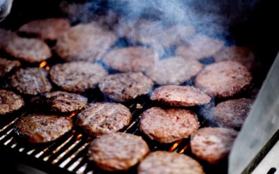 Beef patties on the grill